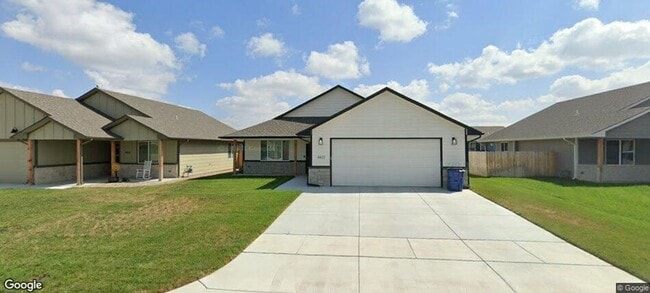 Building Photo - Single Family Home with three bedrooms two bathrooms and two car garage. Zero entry slab home. Mo...