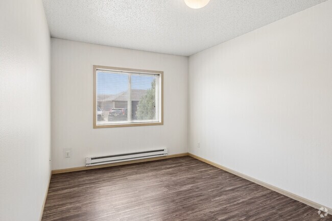 4BR, 3BA - 1,470SF - Primary Bedroom - Dakota Crossing Apartments