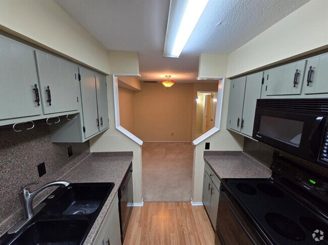 Building Photo - 5669 Birchmont Dr Unit E Rental