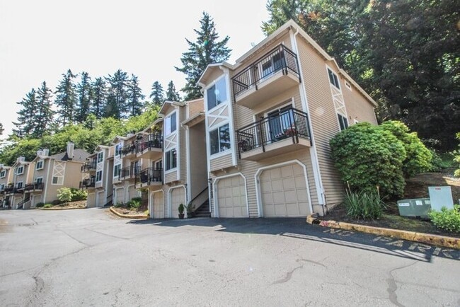 Building Photo - Move In Special!! Half off Rent! Condo with a garage. Newly Remodeled Kitchen. Laminate floors.  ...