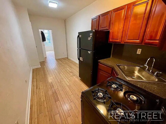 Photo - Spacious 3BR Apartment with Backyard Access in Prime Bushwick Unit 1L