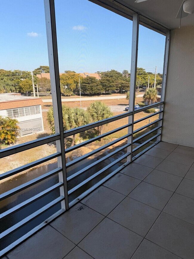 Building Photo - 6289 Lear Dr Unit 404