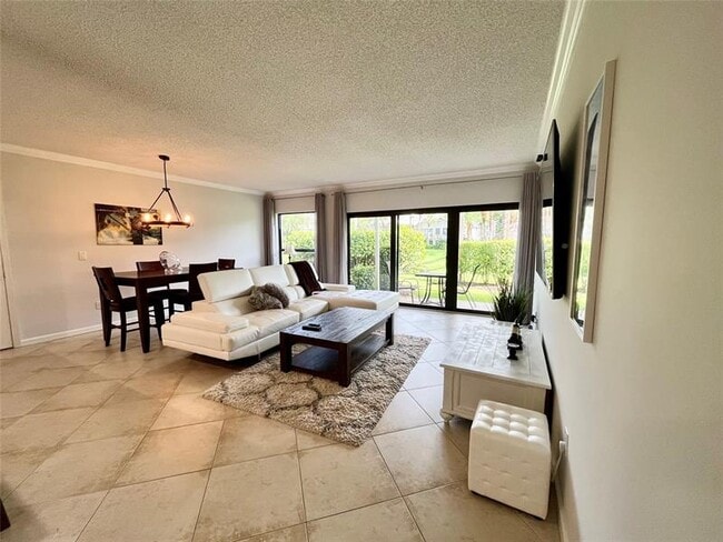 Building Photo - 11863 Wimbledon Cir Unit 401 Rental