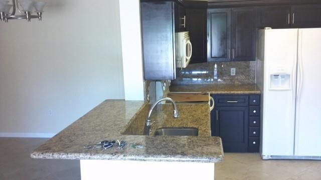 Building Photo - 6976 SW 39th St Unit 107