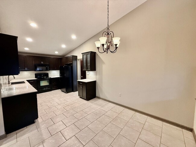 Photo - Spacious 3BR/2BA Home in Terre Haute – Fireplace, Garage, Fenced Yard + Lawn Care Included