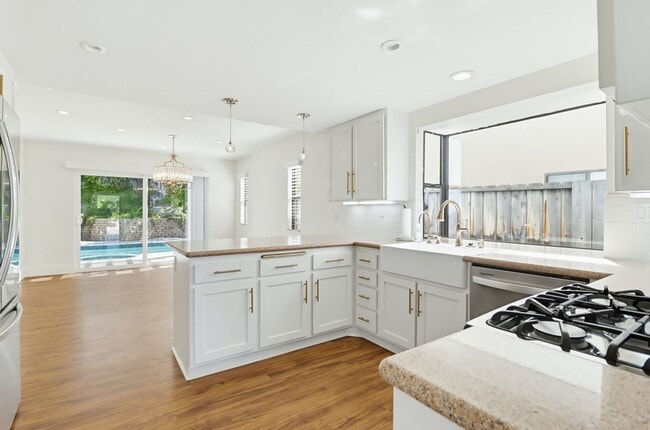 Building Photo - Stunning Upgraded 4BR Home with Pool in Desirable Rancho San Diego – Move-In Ready