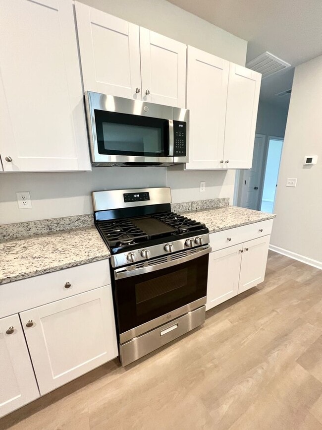 Photo - FOUR Bedrooms! SUPREME location! Move in ready!