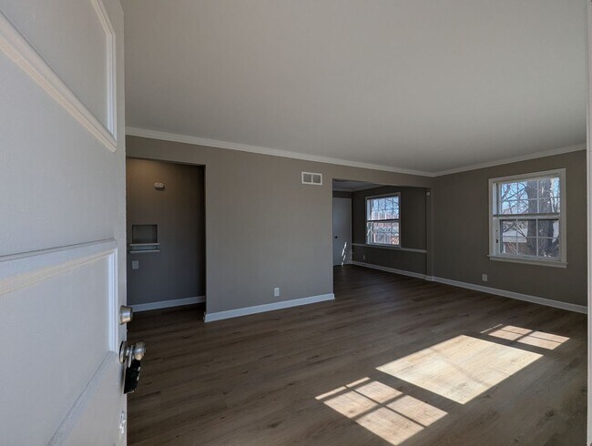 Photo - Fully Renovated Home with Sunroom, Garage & Huge Fenced Yard