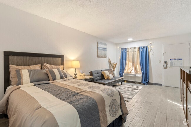 Building Photo - Elite Living Residence Rental