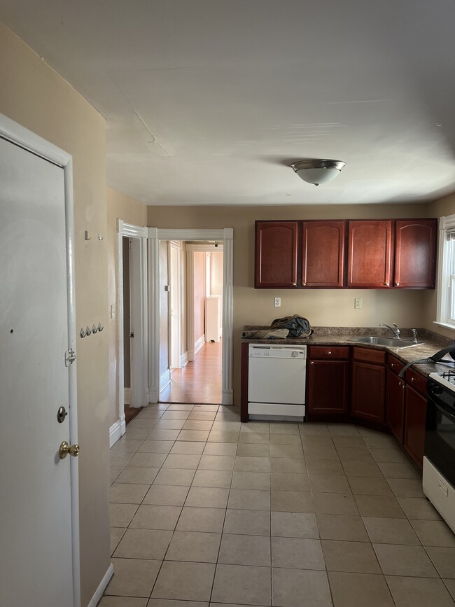 Kitchen with dishwasher - washer and dryer in unit. - 65 Early St Apartments Unit 2