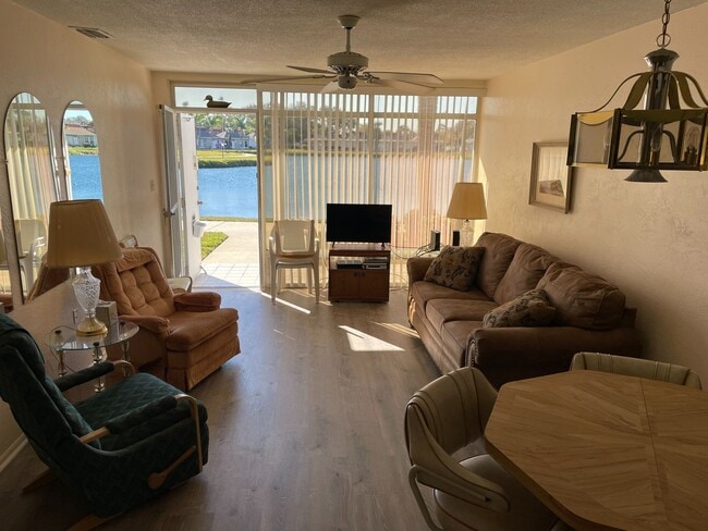 Photo - 1/1 Furnished with Lake View & Utilities in Tahitian Gardens a 55+ Community.