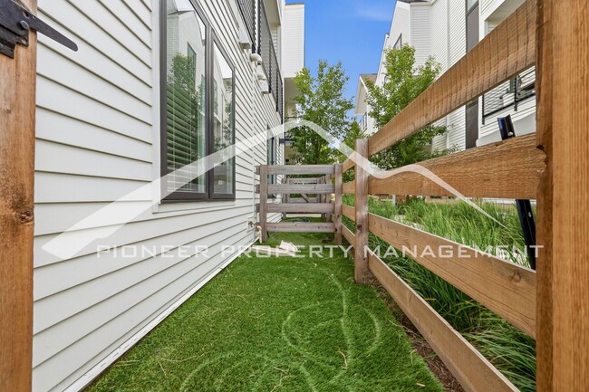 Photo - Spacious Townhouse with Central AC and 2-Car Garage