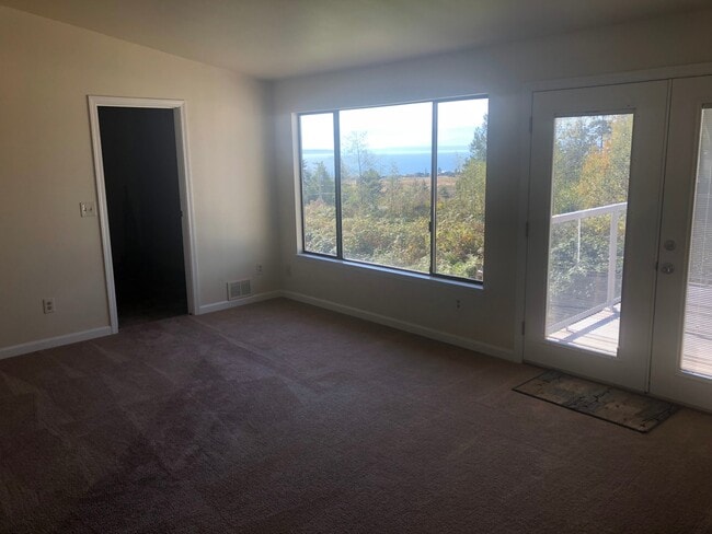 Photo - Charming 2 Bedroom, 2 Bonus Room Home with Beautiful Water view from Porch! Pets Negotiable!