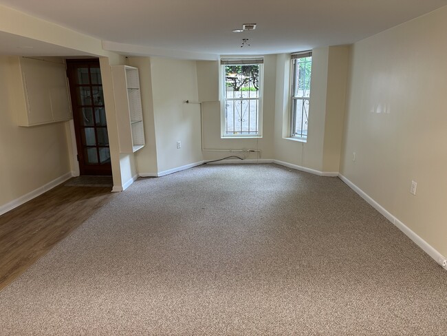Bright and expansive living room - 1336 Kenyon St NW Apartments Unit 1336.5