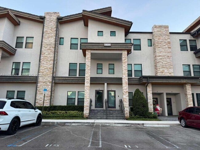 Building Photo - 10473 NW 82nd St Unit 10