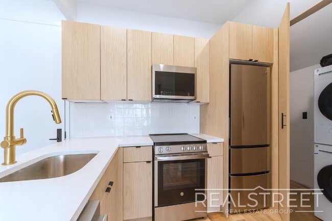 Photo - Brand New Residences with Modern Finishes ...