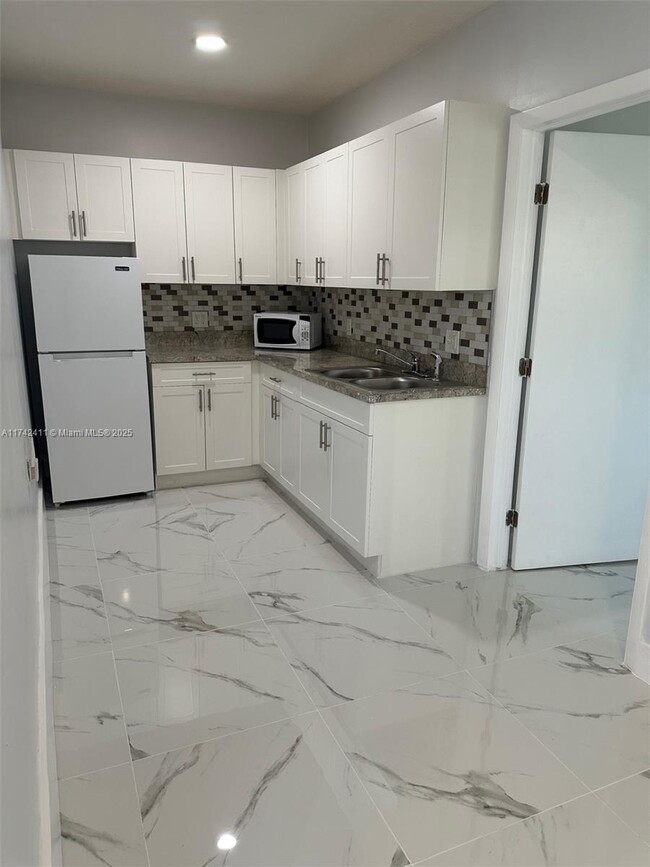 Photo - 800 NW 91st Ave Apartamento Unidad -