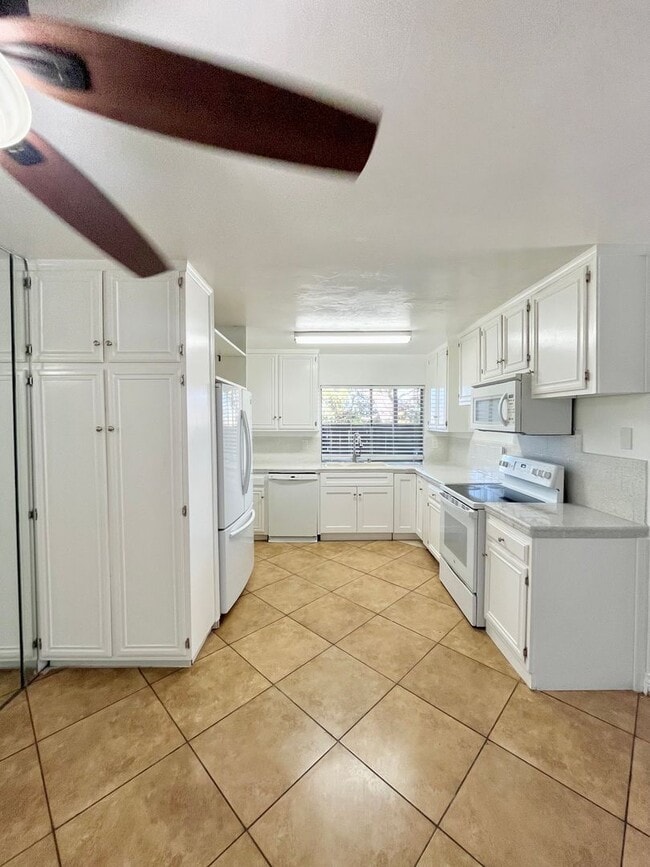 Photo - Spacious 3 Bedroom 2 Bathroom Town-Home with In-Unit Laundry, Pool and 2 Parking Spaces!