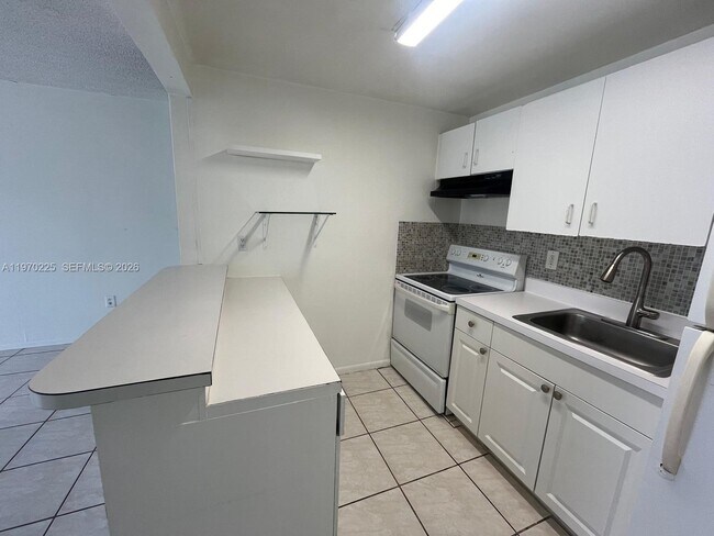 Photo - 4275 NW S Tamiami Canal Dr Unit 2-312