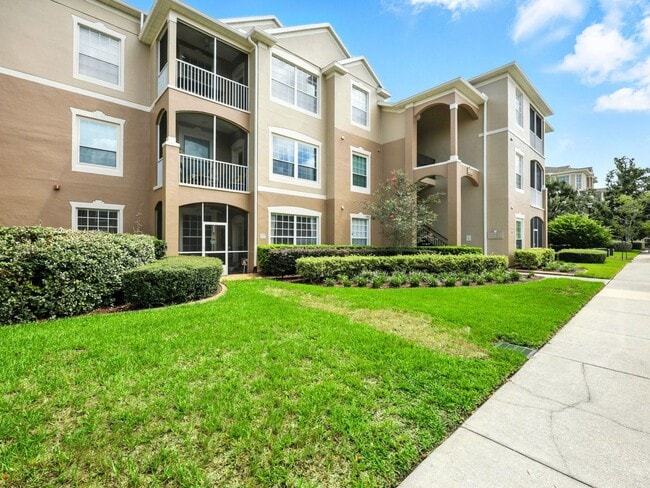 Building Photo - Bright Top-Floor Condo in Resort-Style Gated Community Unit 613