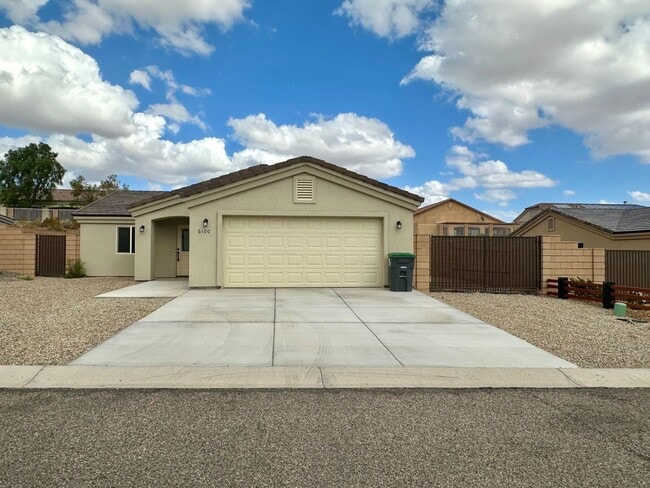 Photo - Modern 3 Bed, 2 Bath Home with Open Floor Plan & New Flooring – Fort Mohave- Available Now!