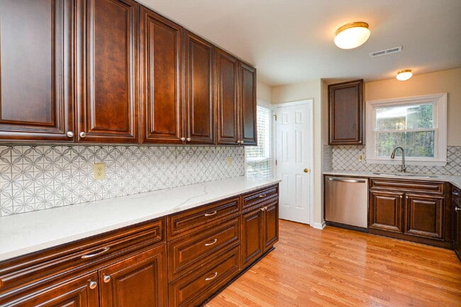 Photo - Primary Suite with Sauna | Finished Basement | Private Backyard Retreat | Tega Cay
3 Bedrooms | 3...