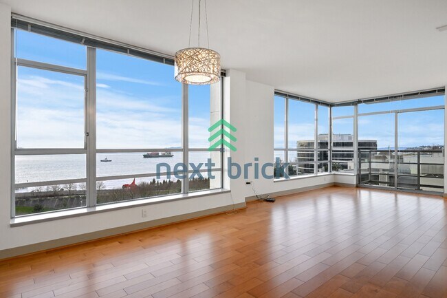 Photo - Stunning 2-Bed Corner Condo with Water and Mountain Views Unit 600