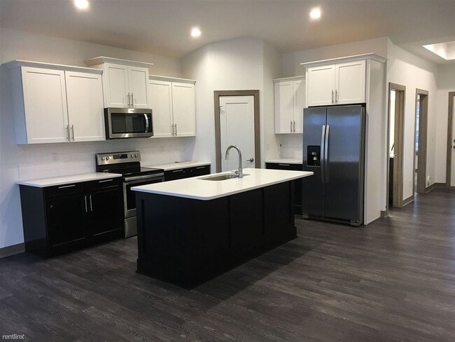 Photo - Spacious 4 bedroom/3 bath home with finished lower level and attached 2 car garage