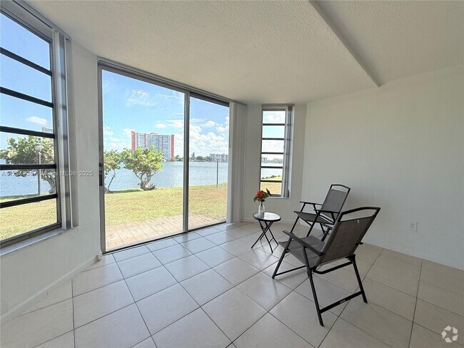 Building Photo - 1302 NE 191st St Unit A118 Rental