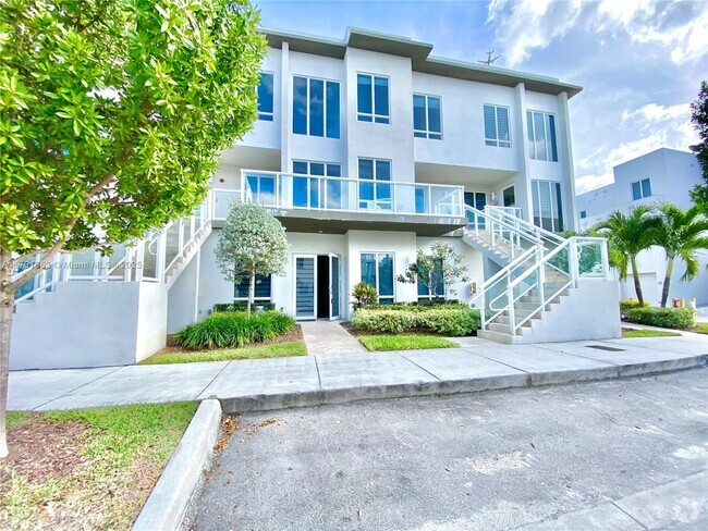 Building Photo - 6415 NW 102nd Path Unit 106 Rental