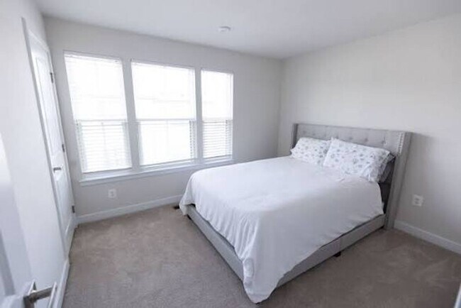 Photo - Available Now! Discover urban living at its finest in this 4-level gem!