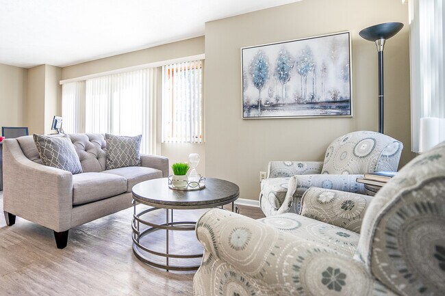 Spacious Living / Dining Area with Sliding Doors to Private Deck/Balcony in Townhome