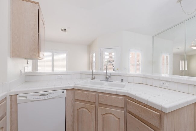 Photo - 3-bedroom 2-bathroom town house with a double car garage, freshly painted and new carpet.