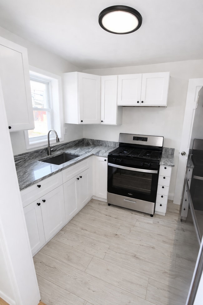 Photo - Renovated Home with Modern Kitchen, Basement & Natural Light