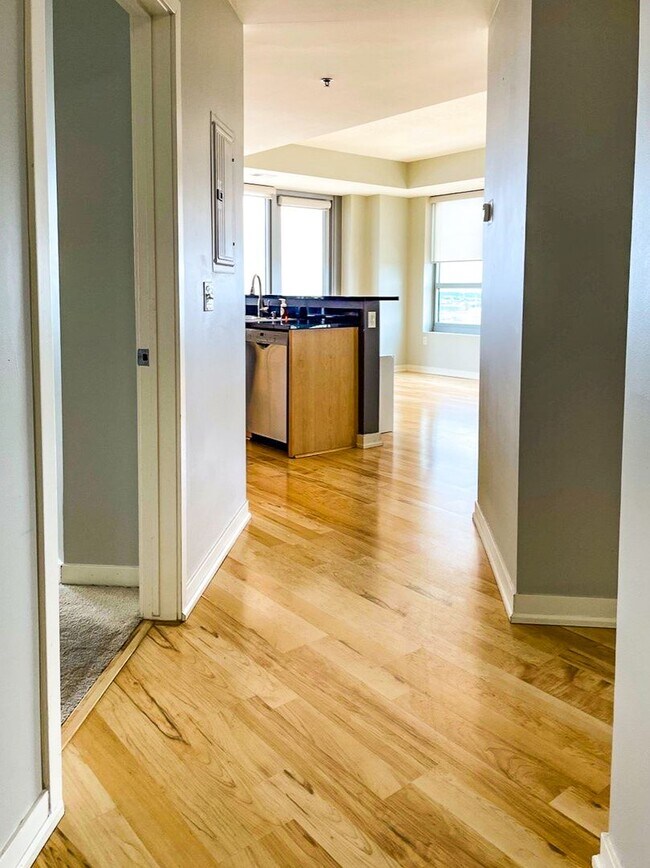 Photo - 21st Floor Corner Unit | Downtown Luxury Living w/ Balcony, Parking & Amenities