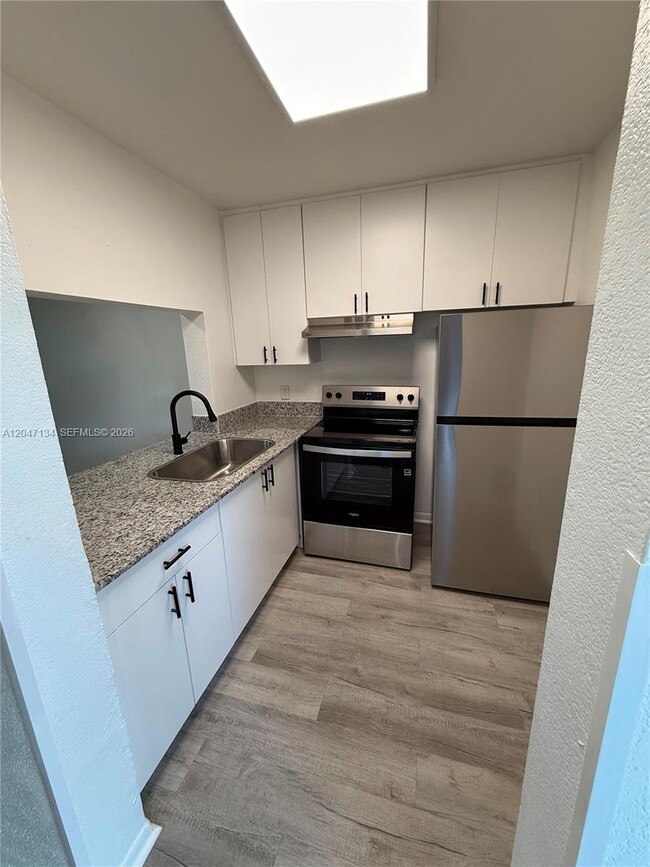 Building Photo - 1220 NW 103rd Ln Unit 413
