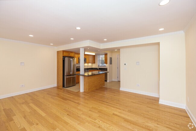 2BR, 1BA - 1,037SF - Living Room & Kitchen