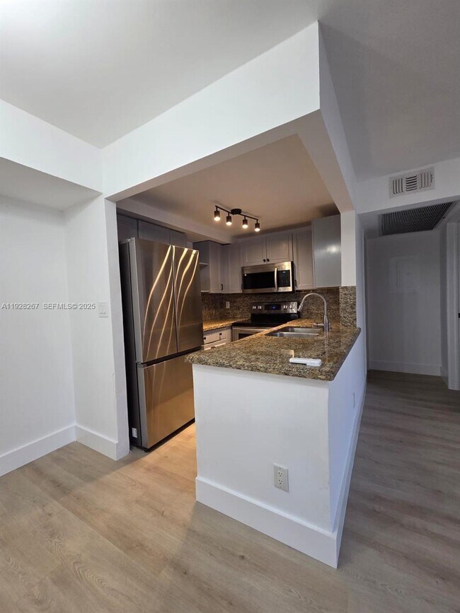 Photo - 10023 Winding Lake Rd Unit 104