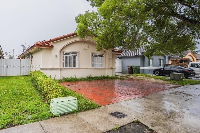Building Photo - 7553 W 4th Ct Rental
