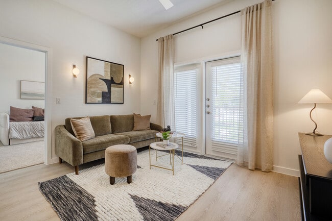Spacious living room with an open, inviting layout at Sageland Flats at Brooks