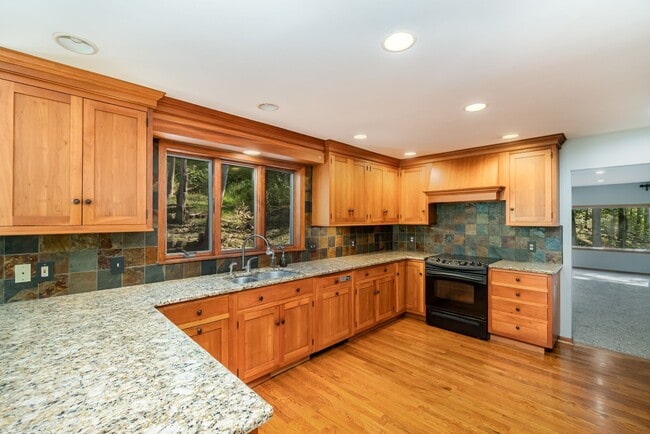 Photo - Stunning 4-Bedroom Home with 5 Full Baths ...