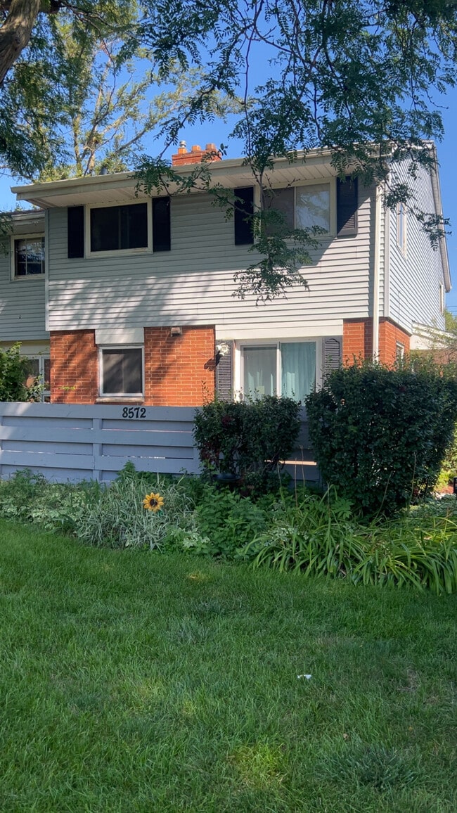 Building Photo - 8572 W Villard Ave Unit 3 Level Townhome- Private Entry