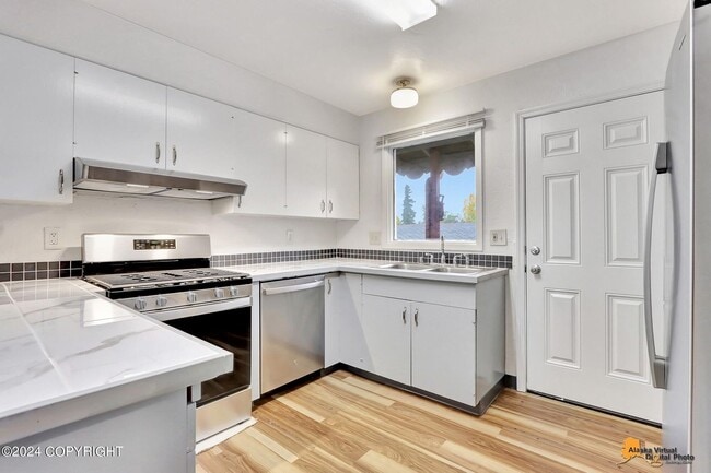 Photo - The Single-Family Alternative: 4BD/2BA Triplex Unit with Modern Comforts Unit #1