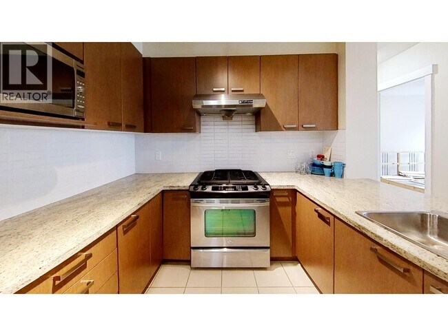 Photo - 9399 Tomicki Ave Unité 228