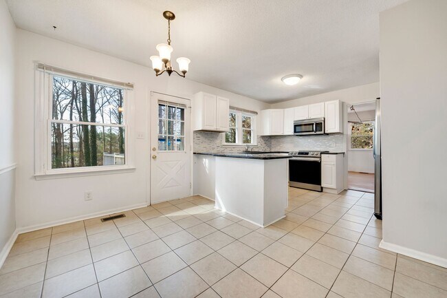 Photo - Just right 3 bedroom, 2 bath ranch with hardwoods and fenced yard!