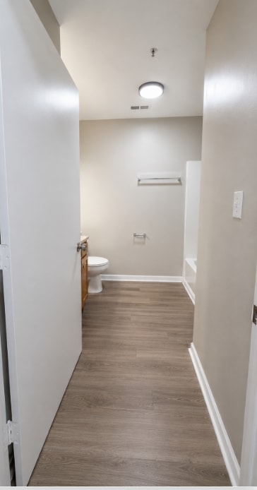 1 bed bathroom hall.png