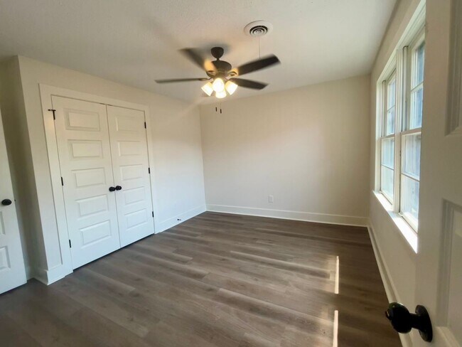 Photo - Fully Renovated 3BR/1.5BA – Prime Location + Lawn Care Included