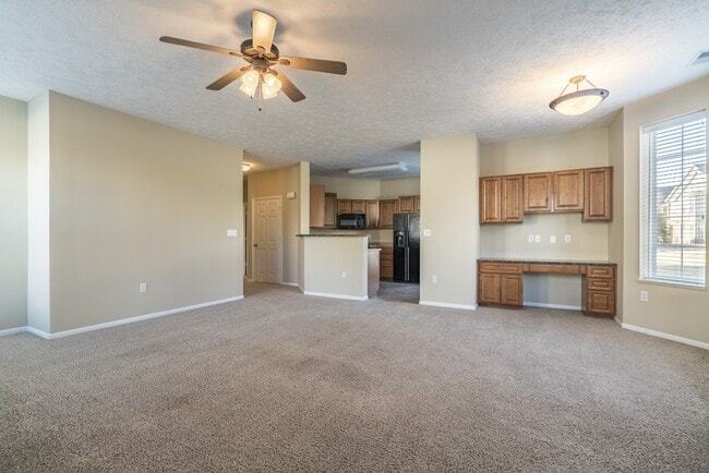 Built in desks offer spaces to do some work, plus extra storage. - Ridge Pointe Villas