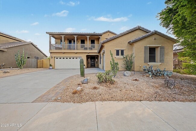 18167 W Wind Song Ave