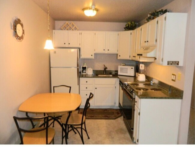 Photo - Perfectly Located Carriage House Condo